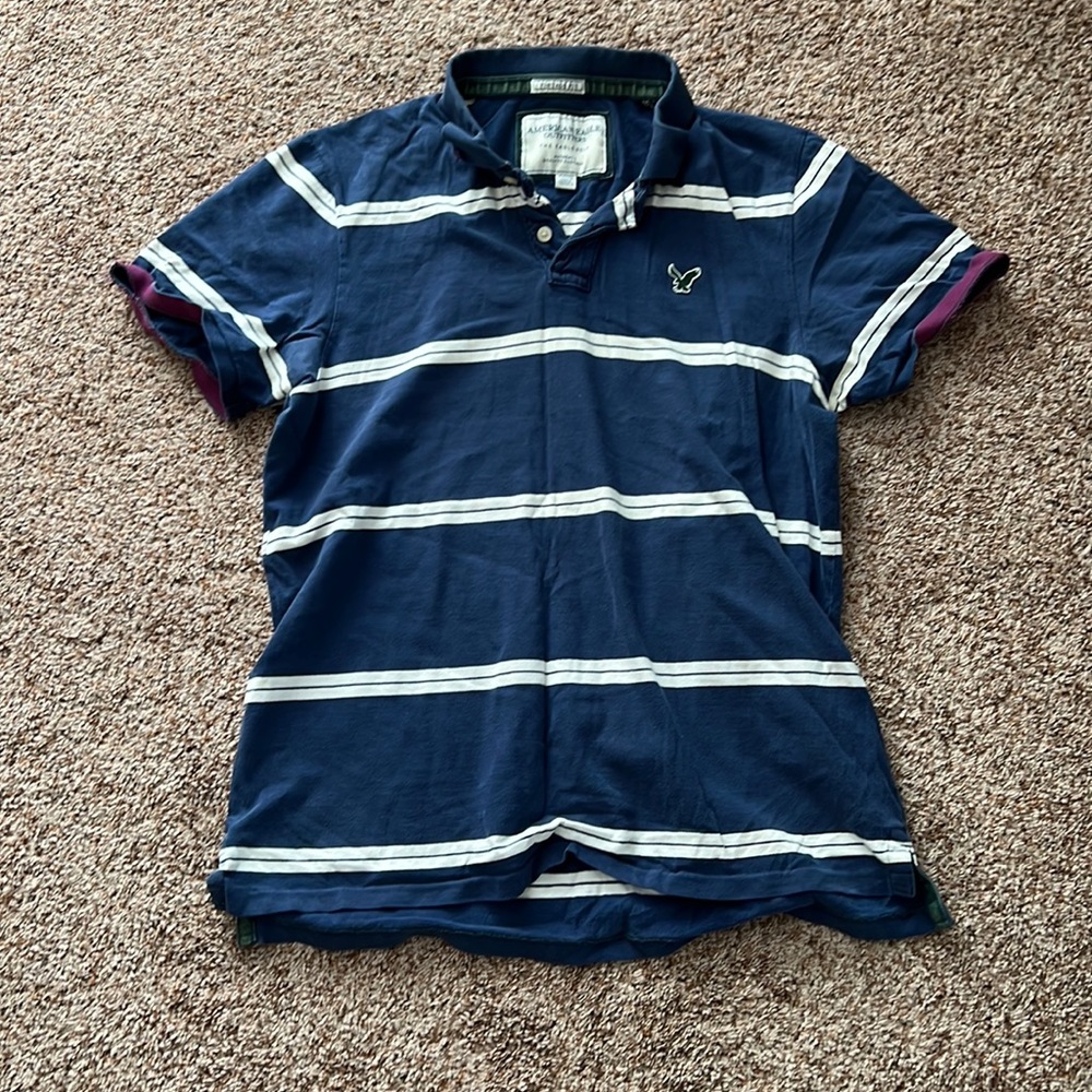 American eagle polo, size XL, navy with white stripes, slightly worn